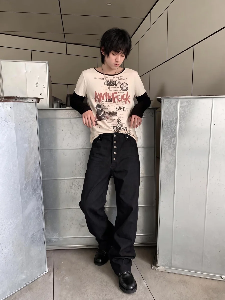 BLACK BUTTONED JEANS